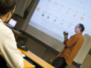 A lecturer delivering a lecture